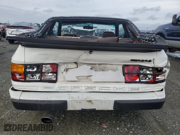 1984 Porsche 944 with VIN WP0AA0944EN453622, listed as a Copart auction lot 85871944 with 92,382 mi miles and Salvage Title. Bid and sale history available at DreamBid. Image 6.