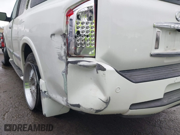 2006 Infiniti QX56 with VIN 5N3AA08A46N802595, listed as a IAAI auction lot 41778222 with 142,241 mi miles. Bid and sale history available at carsss.com. Image 6.