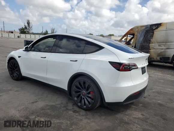 2022 Tesla Model Y Performance with VIN 7SAYGDEFXNF510418, listed as a Copart auction lot 51131465 with 16,263 mi miles and Salvage Title. Bid and sale history available at DreamBid. Image 2.