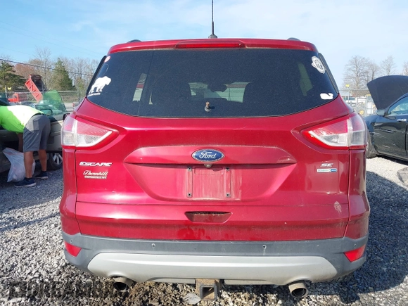 2014 Ford Escape SE with VIN 1FMCU9G90EUD71021, listed as a IAAI auction lot 42052487 with 154,811 mi miles and . Bid and sale history available at DreamBid. Image 17.