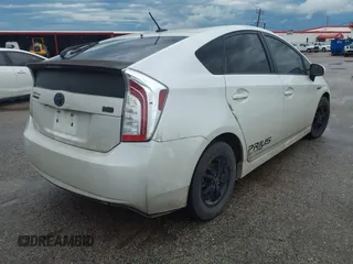 2014 Toyota Prius Four with VIN JTDKN3DU1E1764143, listed as a IAAI auction lot 42189738 with 209,835 mi miles and . Bid and sale history available at DreamBid. Image 4.
