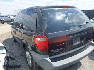 2005 Dodge Caravan SE with VIN 1D4GP25BX5B319579, listed as a IAAI auction lot 42005154 with 191,967 mi miles. Bid and sale history available at carsss.com. Image 3.