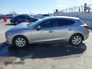 2015 Mazda 3 i Touring with VIN 3MZBM1L75FM224525, listed as a IAAI auction lot 41692928 with 57,803 mi miles and . Bid and sale history available at carsss.com. Image 14.