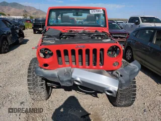 2015 Jeep Wrangler Freedom Edition with VIN 1C4AJWAG1FL613350, listed as a Copart auction lot 61978965 with Not provided miles and Salvage title. Bid and sale history available at DreamBid. Image 5.