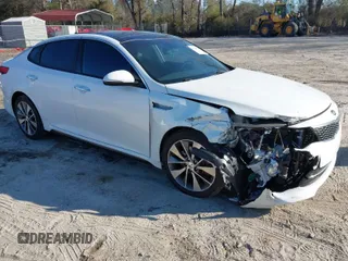 2016 Kia Optima SX Turbo with VIN 5XXGW4L2XGG084628, listed as a IAAI auction lot 41668592 with 116,535 mi miles and . Bid and sale history available at carsss.com. Image 1.
