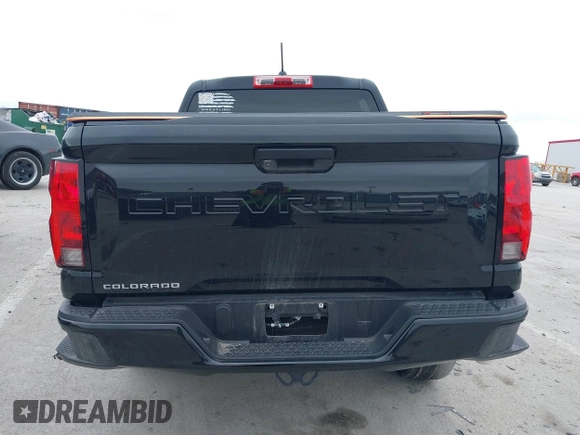 2023 Chevrolet Colorado 4WD Work Truck z VIN 1GCGTBEC4P1198879, wystawiony jako IAAI lot #41322797 z przebiegiem 13 414 mil mil oraz . Historia ofert i sprzedaży dostępna na DreamBid. Obrazek 17.