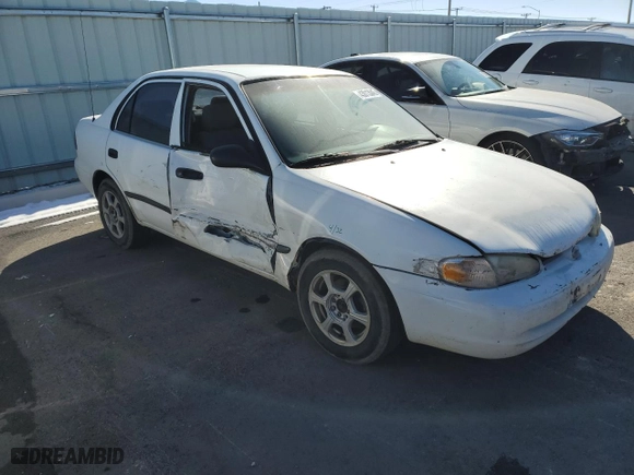 1999 Chevrolet Prizm with VIN 1Y1SK5286XZ441300, listed as a Copart auction lot 43013045 with 253,632 mi miles and Salvage Title. Bid and sale history available at carsss.com. Image 4.