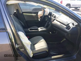 2016 Honda Civic Sedan LX with VIN 2HGFC2F52GH532101, listed as a IAAI auction lot 42009854 with 67,148 mi miles. Bid and sale history available at carsss.com. Image 5.