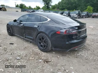 2014 Tesla Model S 60 with VIN 5YJSA1H11EFP65266, listed as a Copart auction lot 60934805 with 93,546 mi miles and Salvage title. Bid and sale history available at DreamBid. Image 2.