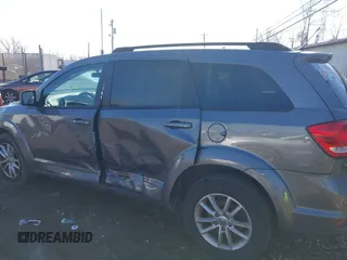 2013 Dodge Journey SXT with VIN 3C4PDDBG6DT580352, listed as a IAAI auction lot 41547504 with 183,871 mi miles and . Bid and sale history available at DreamBid. Image 14.