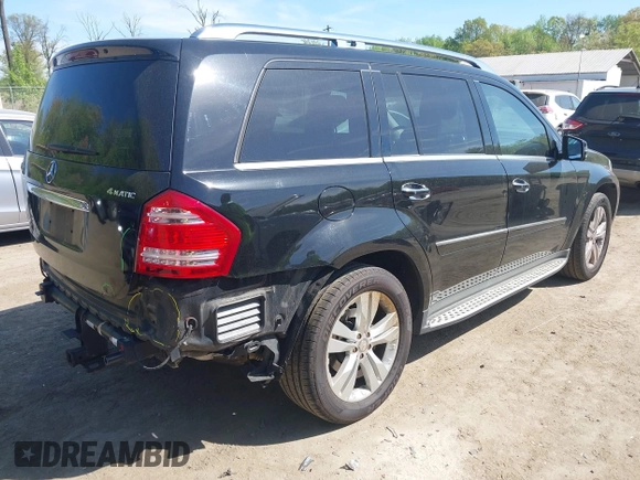2012 Mercedes-Benz GL-Class GL 450 with VIN 4JGBF7BEXCA790393, listed as a IAAI auction lot 42082681 with 143,095 mi miles. Bid and sale history available at carsss.com. Image 4.