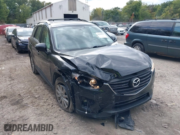 2016 Mazda CX-5 Sport with VIN JM3KE2BE8G0804398, listed as a IAAI auction lot 40490953 with 116,279 mi miles and . Bid and sale history available at DreamBid. Image 6.