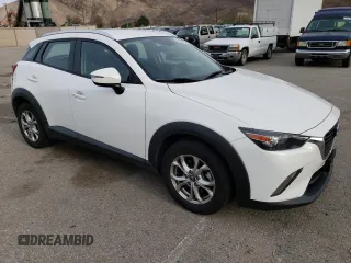 2016 Mazda CX-3 Touring with VIN JM1DKBC71G0123543, listed as a Copart auction lot 84657294 with 113,080 mi miles and Salvage Title. Bid and sale history available at carsss.com. Image 4.