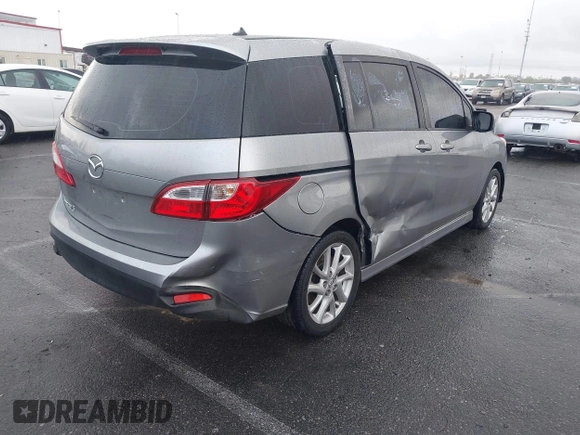 2012 Mazda 5 Touring с VIN JM1CW2CLXC0126576, выставлен на аукционе IAAI как лот 41759917 с пробегом 144 596 миль миль и . История ставок и продаж доступна на DreamBid. Изображение 4.