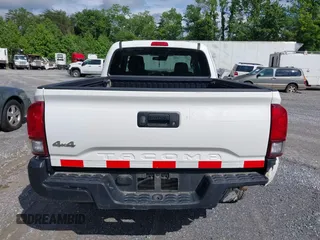2019 Toyota Tacoma SR z VIN 5TFSX5EN1KX067514, wystawiony jako IAAI lot #42264001 z przebiegiem 179 048 mil mil oraz . Historia ofert i sprzedaży dostępna na DreamBid. Obrazek 16.