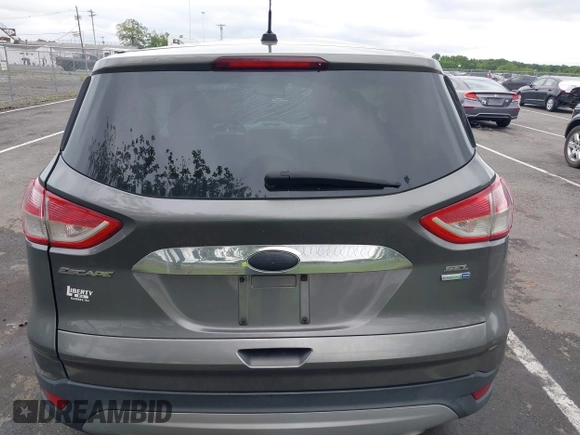 2013 Ford Escape SEL z VIN 1FMCU9H96DUC66206, wystawiony jako IAAI lot #42376442 z przebiegiem 96 776 mil mil oraz . Historia ofert i sprzedaży dostępna na DreamBid. Obrazek 16.