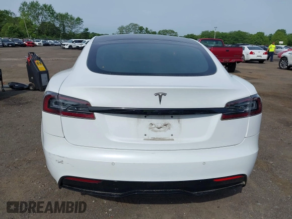 2022 Tesla Model S with VIN 5YJSA1E58NF467644, listed as a IAAI auction lot 42344403 with 52,628 mi miles and . Bid and sale history available at DreamBid. Image 16.