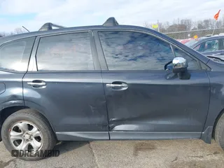 2015 Subaru Forester 2.5i with VIN JF2SJAAC8FG429845, listed as a IAAI auction lot 41321849 with 144,005 mi miles. Bid and sale history available at carsss.com. Image 14.