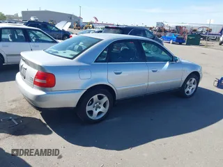 2000 Audi A4 with VIN WAUDH28DXYA145742, listed as a IAAI auction lot 42017244 with 235,373 mi miles. Bid and sale history available at carsss.com. Image 4.
