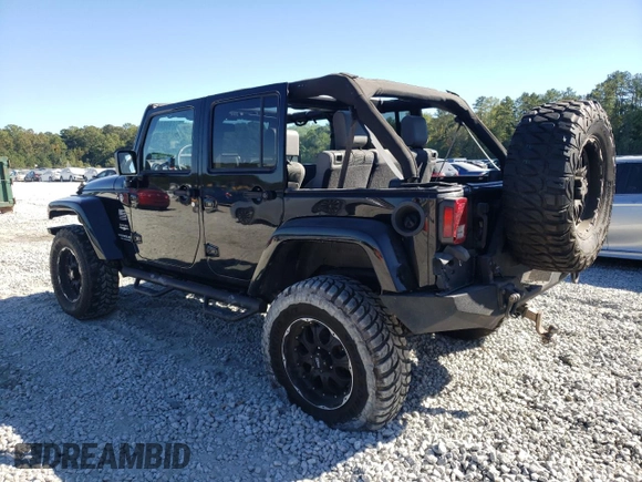 2007 Jeep Wrangler Unlimited Sahara with VIN 1J4GA59197L141821, listed as a Copart auction lot 76897044 with 124,070 mi miles and Salvage title. Bid and sale history available at DreamBid. Image 2.