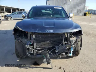 2014 Jeep Grand Cherokee Limited with VIN 1C4RJEBT0EC141553, listed as a Copart auction lot 50835405 with 61,585 mi miles and Salvage Title. Bid and sale history available at DreamBid. Image 5.