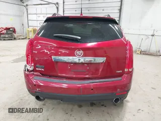 2014 Cadillac SRX Performance Collection z VIN 3GYFNCE30ES596415, wystawiony jako IAAI lot #42329771 z przebiegiem 71 620 mil mil oraz . Historia ofert i sprzedaży dostępna na DreamBid. Obrazek 16.