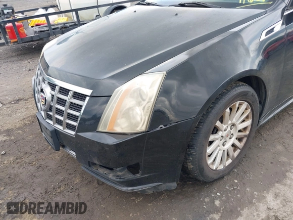 2012 Cadillac CTS with VIN 1G6DC5E52C0116219, listed as a IAAI auction lot 42463440 with 190,818 mi miles and . Bid and sale history available at DreamBid. Image 6.