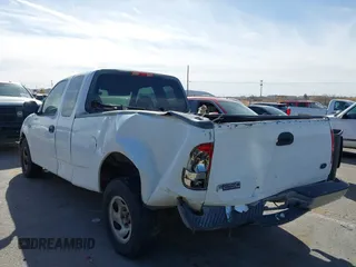 2003 Ford F-150 XL with VIN 1FTRX17213NA81064, listed as a IAAI auction lot 41796923 with 339,333 mi miles. Bid and sale history available at carsss.com. Image 6.
