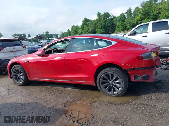 2020 Tesla Model S Long Range with VIN 5YJSA1E25LF396213, listed as a IAAI auction lot 42383231 with 73,125 mi miles and . Bid and sale history available at DreamBid. Image 14.