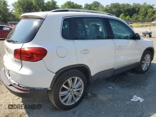 2012 Volkswagen Tiguan SEL with VIN WVGAV7AX0CW535644, listed as a Copart auction lot 54335534 with 156,079 mi miles and Salvage Title. Bid and sale history available at DreamBid. Image 3.