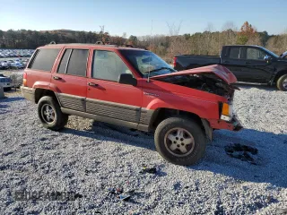 1995 Jeep Grand Cherokee Laredo with VIN 1J4GZ58S7SC747906, listed as a Copart auction lot 82529374 with 73,932 mi miles and Salvage Title. Bid and sale history available at carsss.com. Image 4.