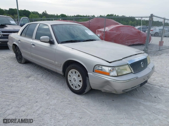 2004 Mercury Grand Marquis GS with VIN 2MEFM74W04X669087, listed as a IAAI auction lot 42090394 with 172,008 mi miles. Bid and sale history available at carsss.com. Image 1.