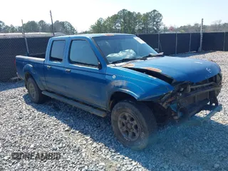 2004 Nissan Frontier XE z VIN 1N6ED29X54C451500, wystawiony jako IAAI lot #41774574 z przebiegiem 204 564 mil mil oraz . Historia ofert i sprzedaży dostępna na DreamBid. Obrazek 1.