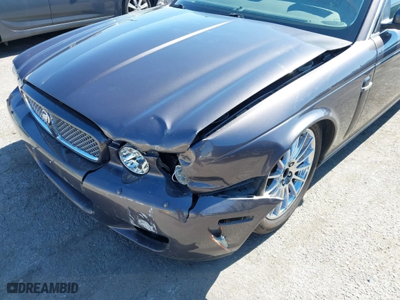 2008 Jaguar XJ with VIN SAJWA71B68SH22853, listed as a IAAI auction lot 41678688 with 76,367 mi miles. Bid and sale history available at carsss.com. Image 6.