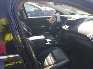 2017 Ford Escape SE with VIN 1FMCU9GD5HUC70341, listed as a IAAI auction lot 41801365 with 135,439 mi miles. Bid and sale history available at carsss.com. Image 5.