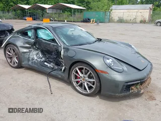 2021 Porsche 911 Carrera S with VIN WP0AB2A97MS221855, listed as a IAAI auction lot 42357482 with 22,766 mi miles and . Bid and sale history available at DreamBid. Image 1.