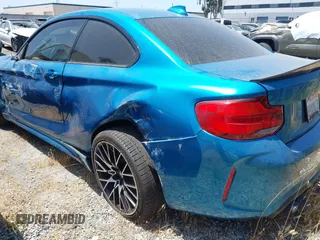 2018 BMW M2 z VIN WBS1J5C59JVE51997, wystawiony jako IAAI lot #42348421 z przebiegiem 51 376 mil mil oraz . Historia ofert i sprzedaży dostępna na DreamBid. Obrazek 3.