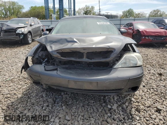 2005 Mercury Sable LS z VIN 1MEFM55S75A619345, wystawiony jako Copart lot #55858325 z przebiegiem Nie podano mil oraz Szkoda całkowita • Salvage title. Historia ofert i sprzedaży dostępna na DreamBid. Obrazek 5.