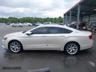 2014 Chevrolet Impala LTZ with VIN 1G1155S38EU105260, listed as a IAAI auction lot 42012082 with 230,407 mi miles. Bid and sale history available at carsss.com. Image 14.