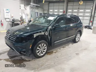 2018 Volkswagen Tiguan SEL with VIN 3VV2B7AX8JM113976, listed as a IAAI auction lot 42310576 with 100,319 mi miles and . Bid and sale history available at DreamBid. Image 2.
