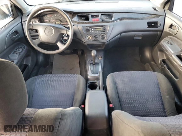2002 Mitsubishi Lancer LS with VIN JA3AJ36E02U064779, listed as a Copart auction lot 86749184 with 127,343 mi miles and Salvage Title. Bid and sale history available at carsss.com. Image 8.
