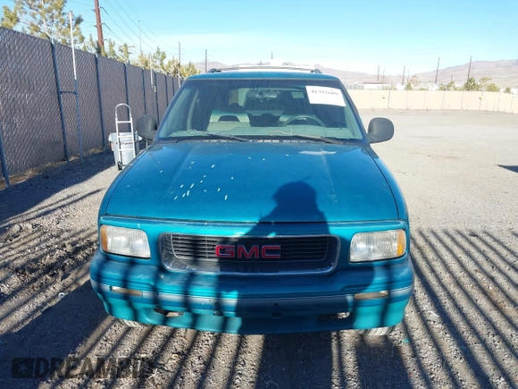 1996 GMC Jimmy SL z VIN 1GKDT13W6T2505181, wystawiony jako IAAI lot #41392669 z przebiegiem 213 728 mil mil oraz . Historia ofert i sprzedaży dostępna na DreamBid. Obrazek 6.