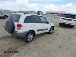 2003 Toyota RAV4 with VIN JTEGH20V330094437, listed as a IAAI auction lot 41960989 with 195,887 mi miles and . Bid and sale history available at DreamBid. Image 4.