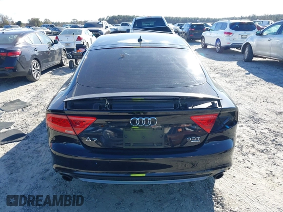 2013 Audi A7 3.0 Prestige with VIN WAU2GAFC2DN065112, listed as a IAAI auction lot 41117426 with 159,105 mi miles. Bid and sale history available at carsss.com. Image 17.