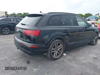 2018 Audi Q7 Prestige with VIN WA1VABF72JD024890, listed as a IAAI auction lot 42464089 with 76,643 mi miles and . Bid and sale history available at DreamBid. Image 4.