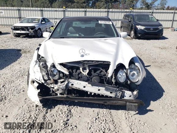 2001 Mercedes-Benz E-Class with VIN WDBJF70J11B285493, listed as a Copart auction lot 77170114 with 226,226 mi miles and Salvage Title. Bid and sale history available at carsss.com. Image 5.
