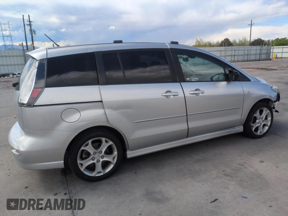 2009 Mazda 5 Grand Touring with VIN JM1CR293390335231, listed as a Copart auction lot 55560285 with 96,502 mi miles and Salvage title. Bid and sale history available at DreamBid. Image 3.