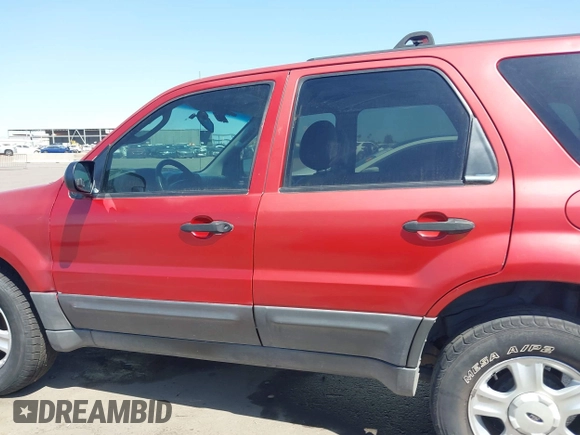 2003 Ford Escape XLT Popular 2 with VIN 1FMYU93123KB02310, listed as a IAAI auction lot 41975073 with 169,864 mi miles. Bid and sale history available at carsss.com. Image 14.