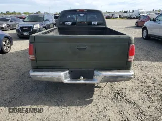 1999 Dodge Dakota SLT with VIN 1B7GL22X1XS228549, listed as a Copart auction lot 52900205 with 58,760 mi miles and Clean Title. Bid and sale history available at carsss.com. Image 6.