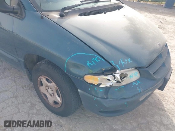 2000 Dodge Caravan with VIN 2B4GP25R5YR851917, listed as a IAAI auction lot 41833056 with 176,863 mi miles and . Bid and sale history available at DreamBid. Image 6.